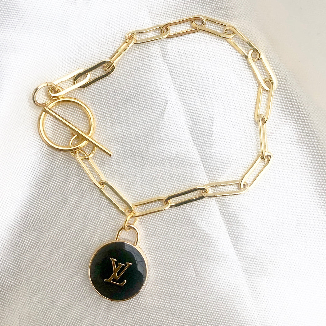 Louis Vuitton Gold Charm Bracelet  Gold charm bracelet, Vintage charm  bracelet, Louis vuitton jewelry