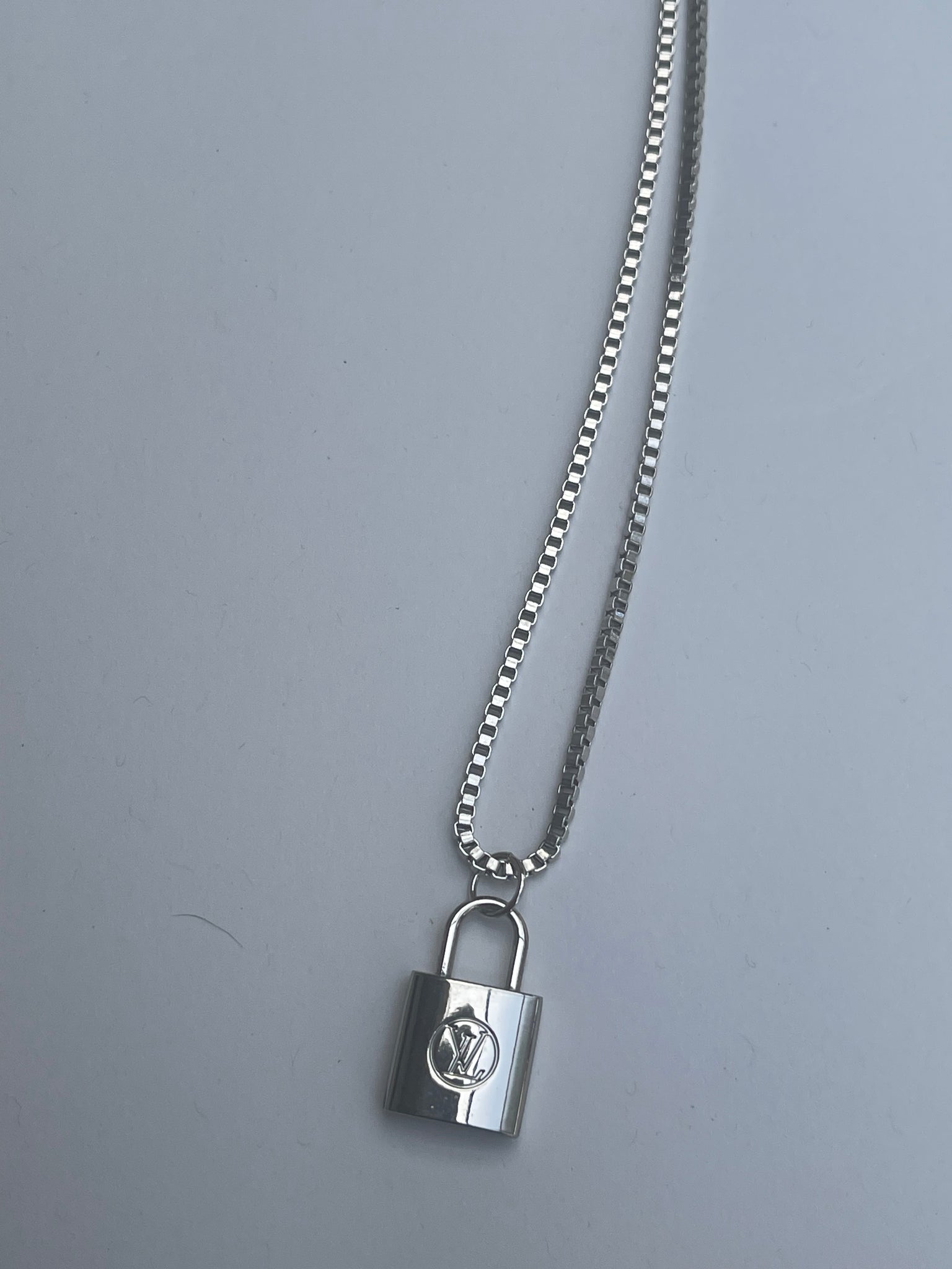 louis vuitton silver lock necklace